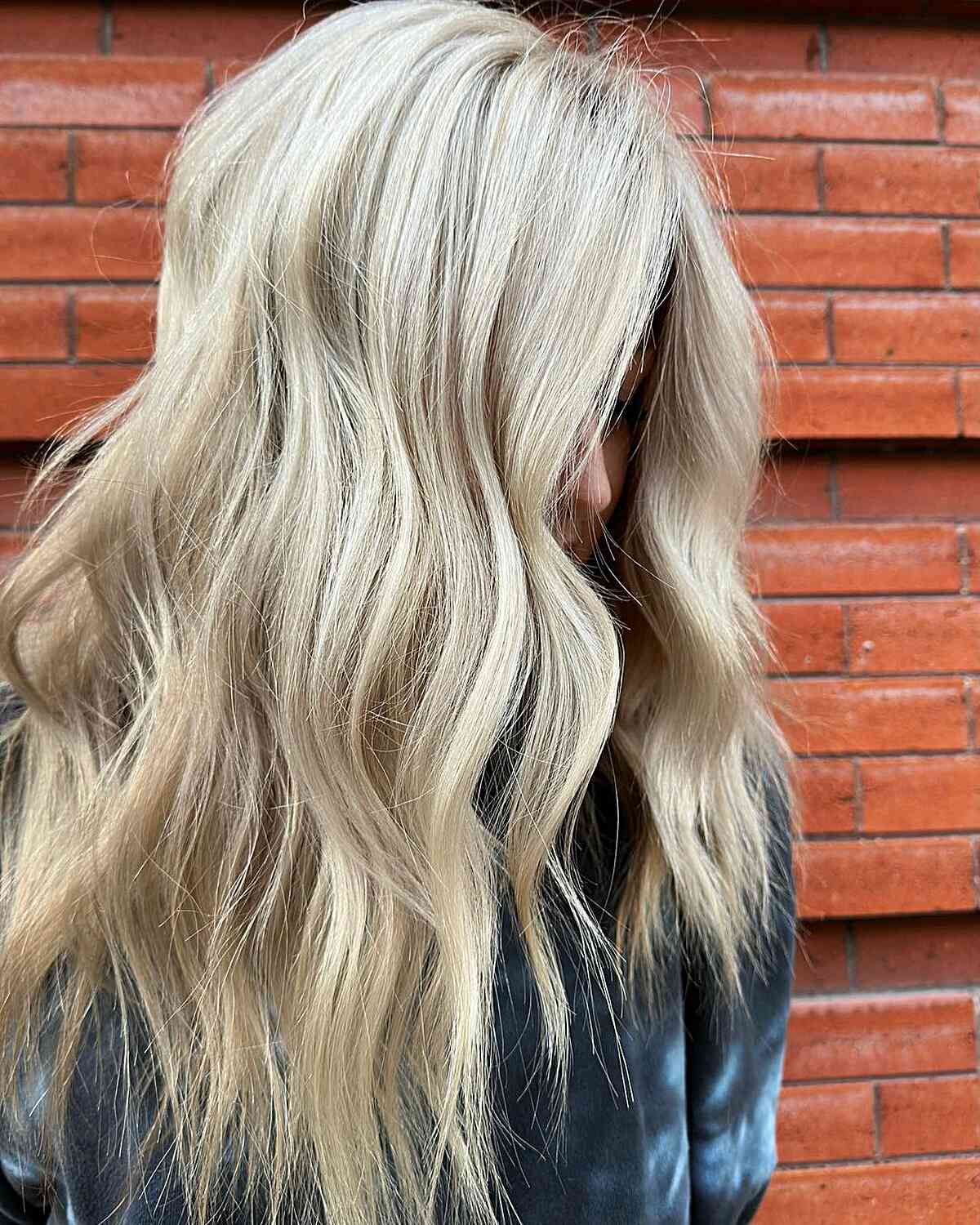 Bright Light Blonde Hairstyle for women with long thick hair