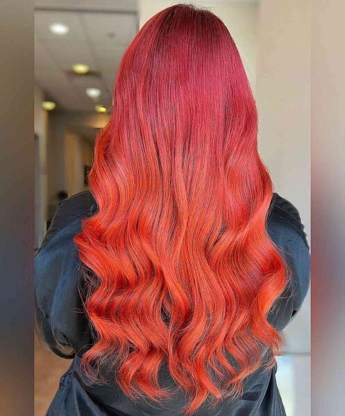 A Bright Red Balayage Ombre on Long Hair