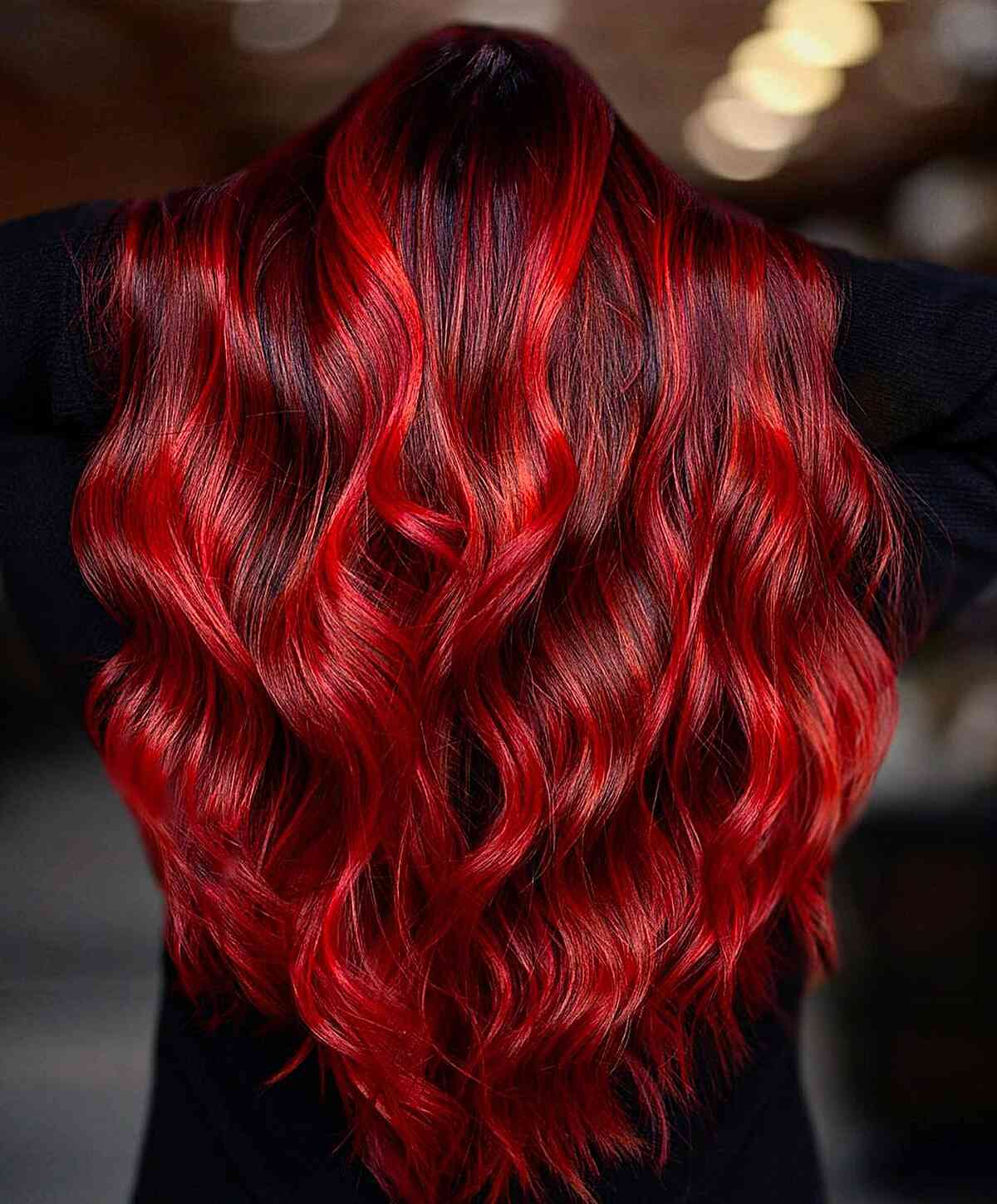 Bright Red Balayage with Dark Roots for Long Hair