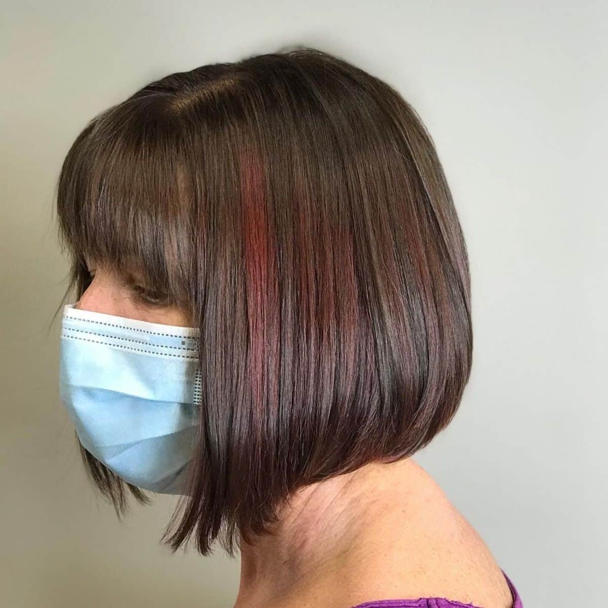 Brown and pink shorter graduated bob with fringe