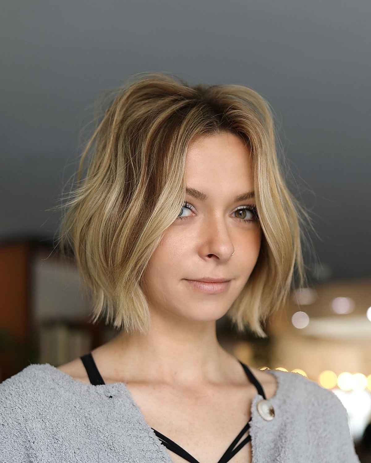 Casual brown angled bob with blonde highlights