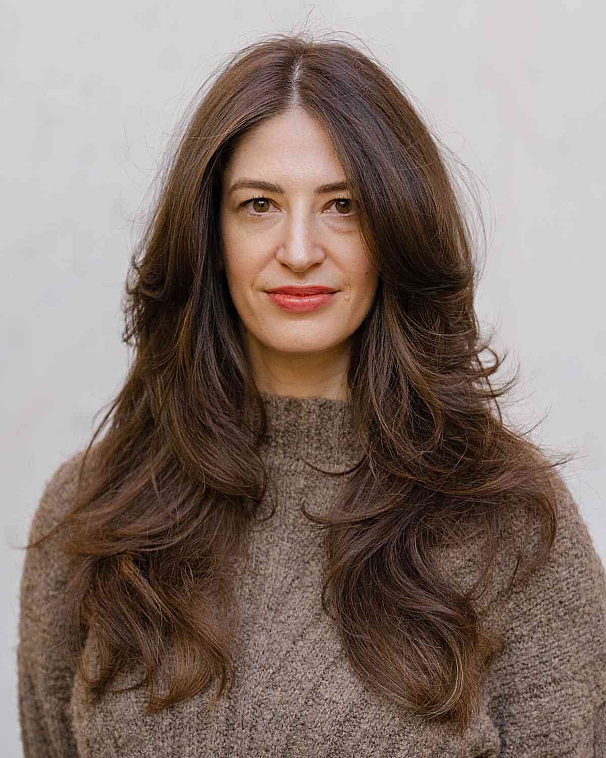Long-Length Brown Butterfly Hair with Bouncy Waves for Oval Faces