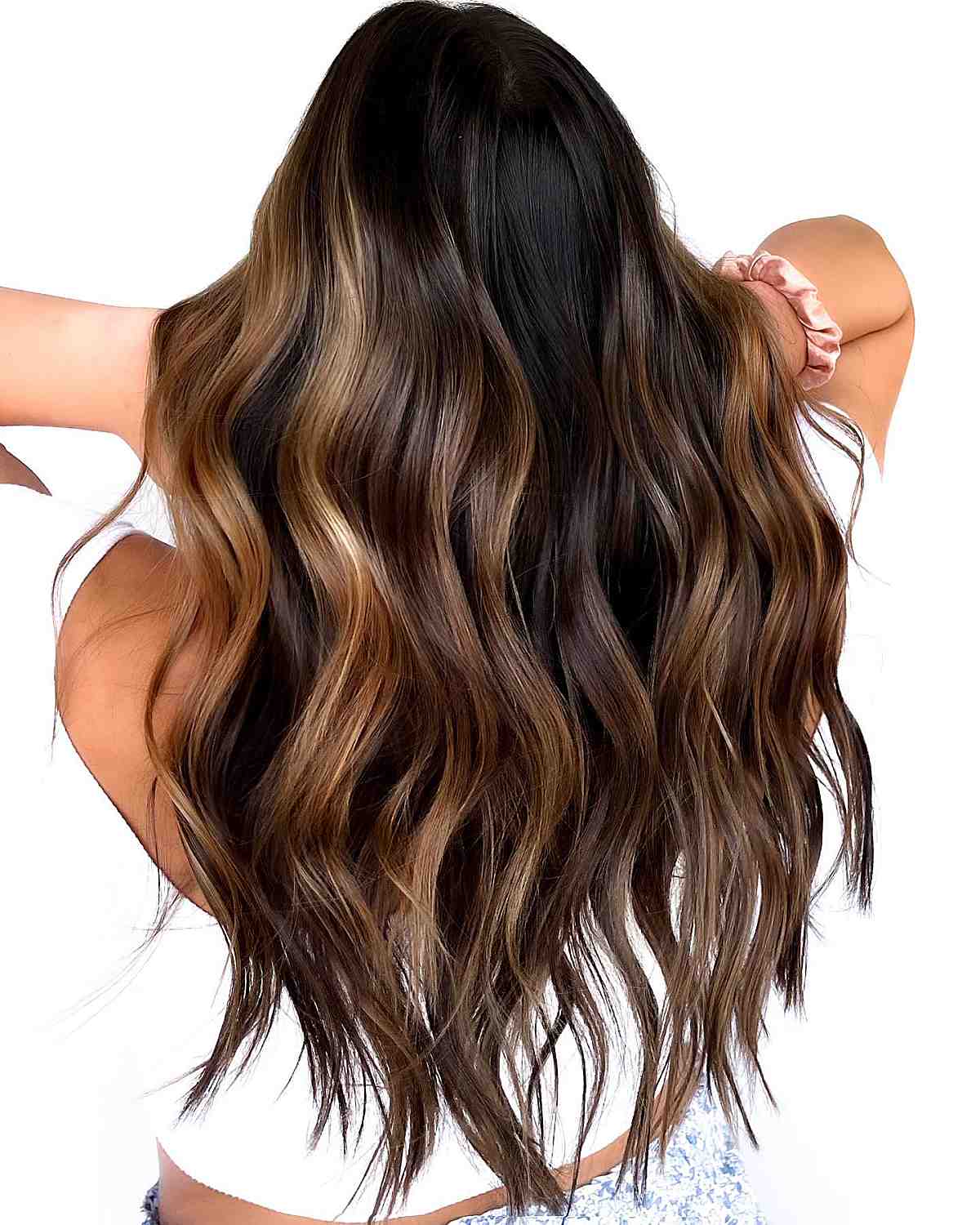 Brown hair with subtle caramel highlights