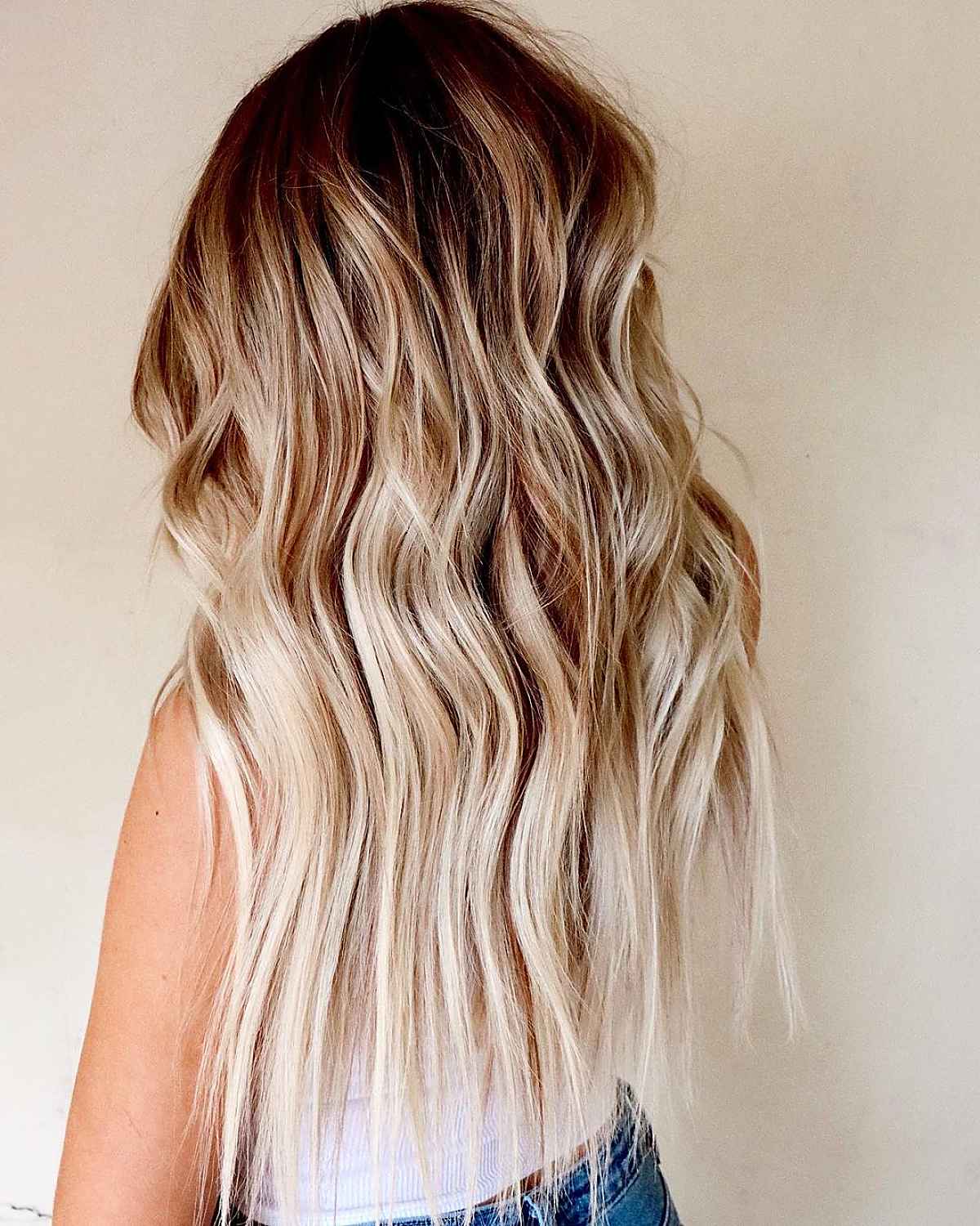 Sexiest brown to light blonde balayage