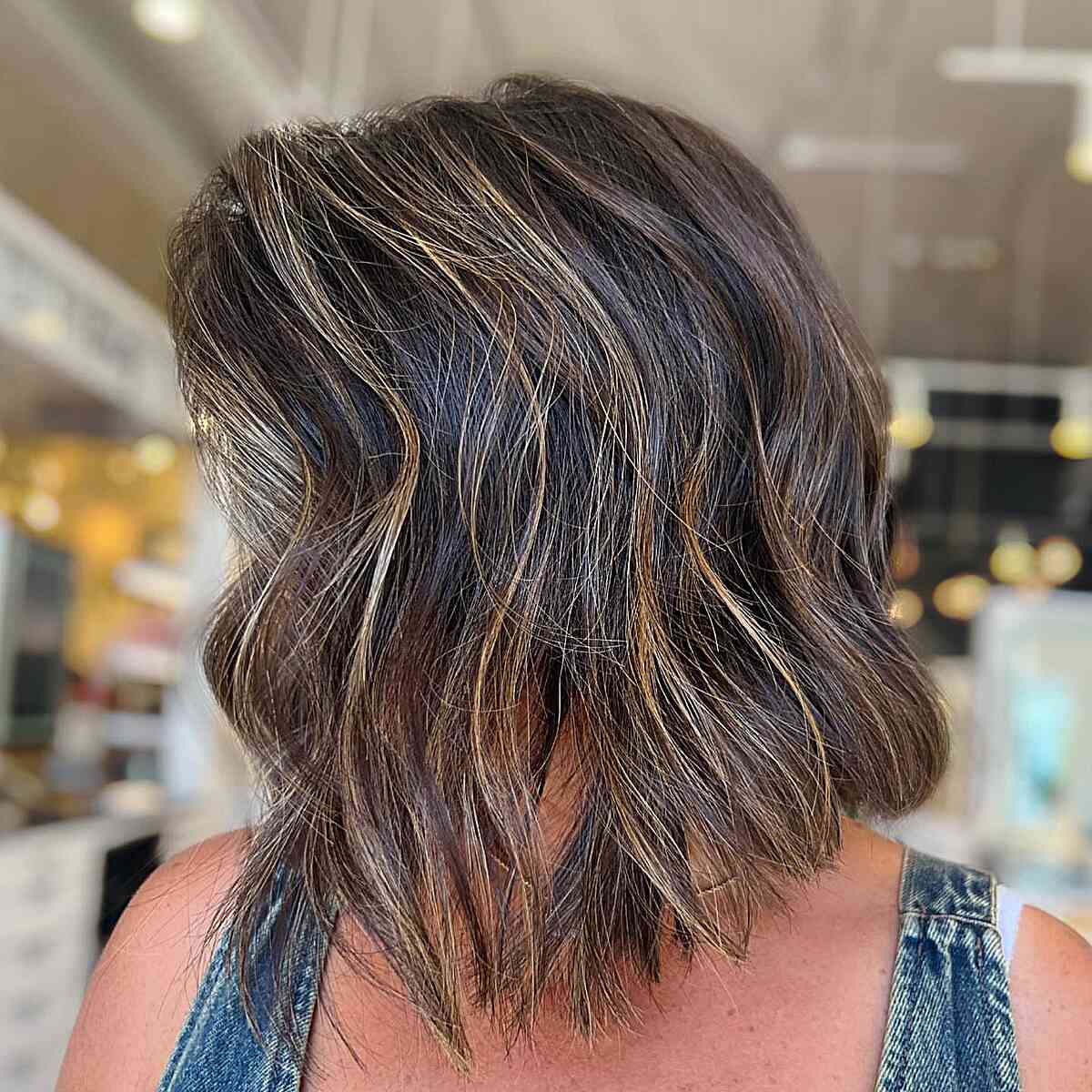 Brunette Angled Lob with Highlights and Waves