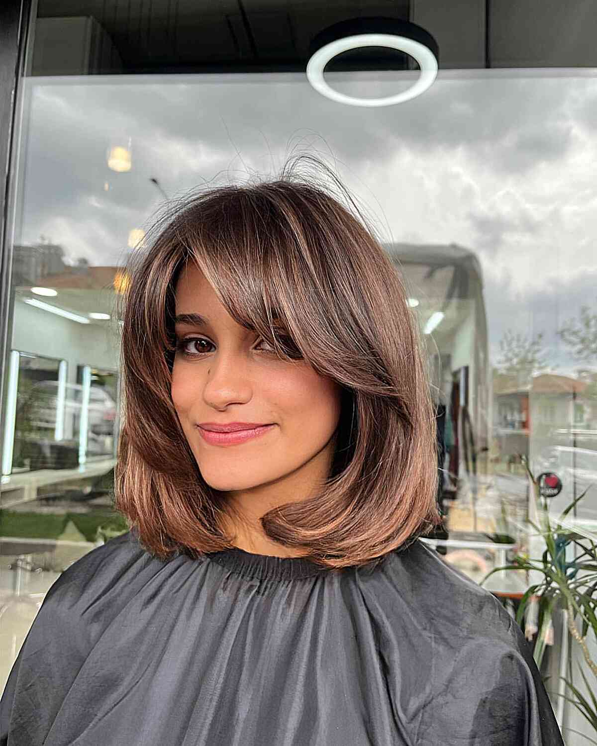 Brunette Balayage Lob with Swoop Bangs for Longer Face Shapes