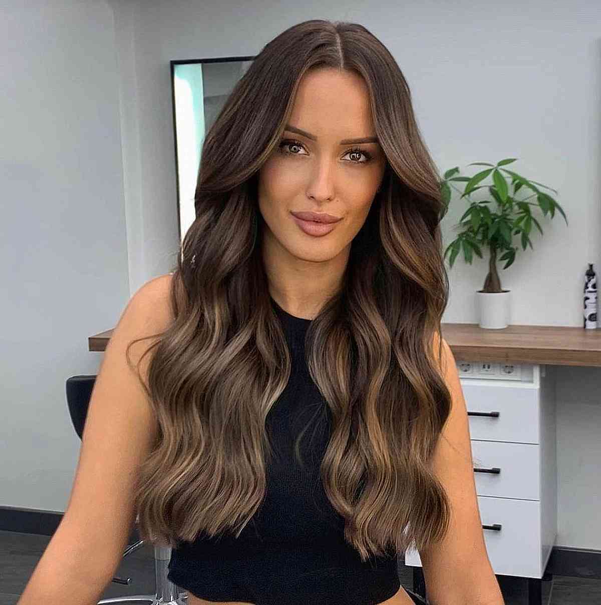 Dimensional Brunette Balayage on Long Wavy Hair for Long Faces