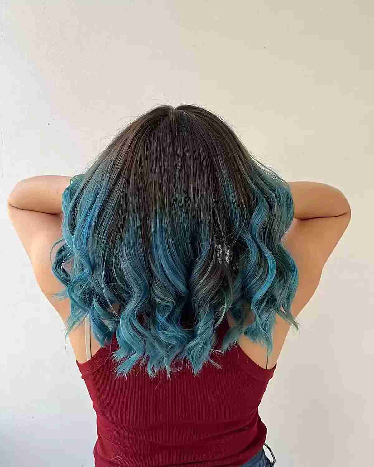 Brunette Balayage with Saturated Blue Tips on Curled Medium Hair