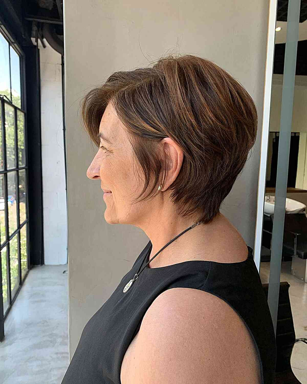 Brunette Lixie Cut with Side Part on Older Ladies