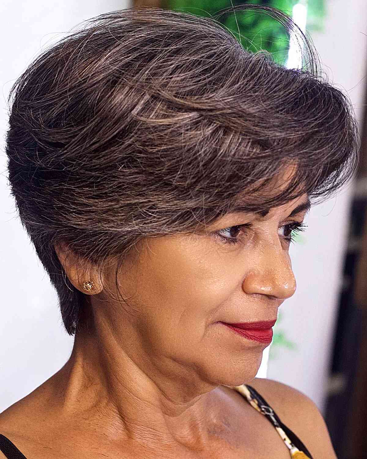 Brunette Lixie with Feathered Layers for Older Women with Sweeping Bangs