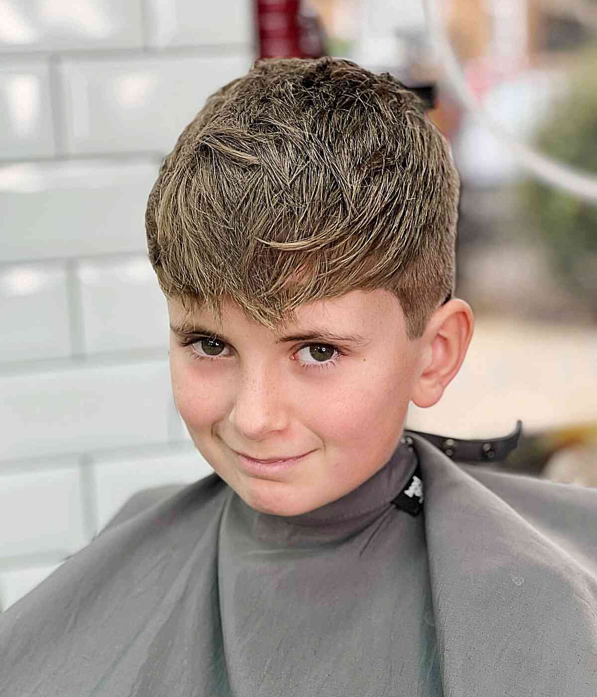 Brushed Forward with a Slight Fade for Little Guys with Medium-Length Hair on Top