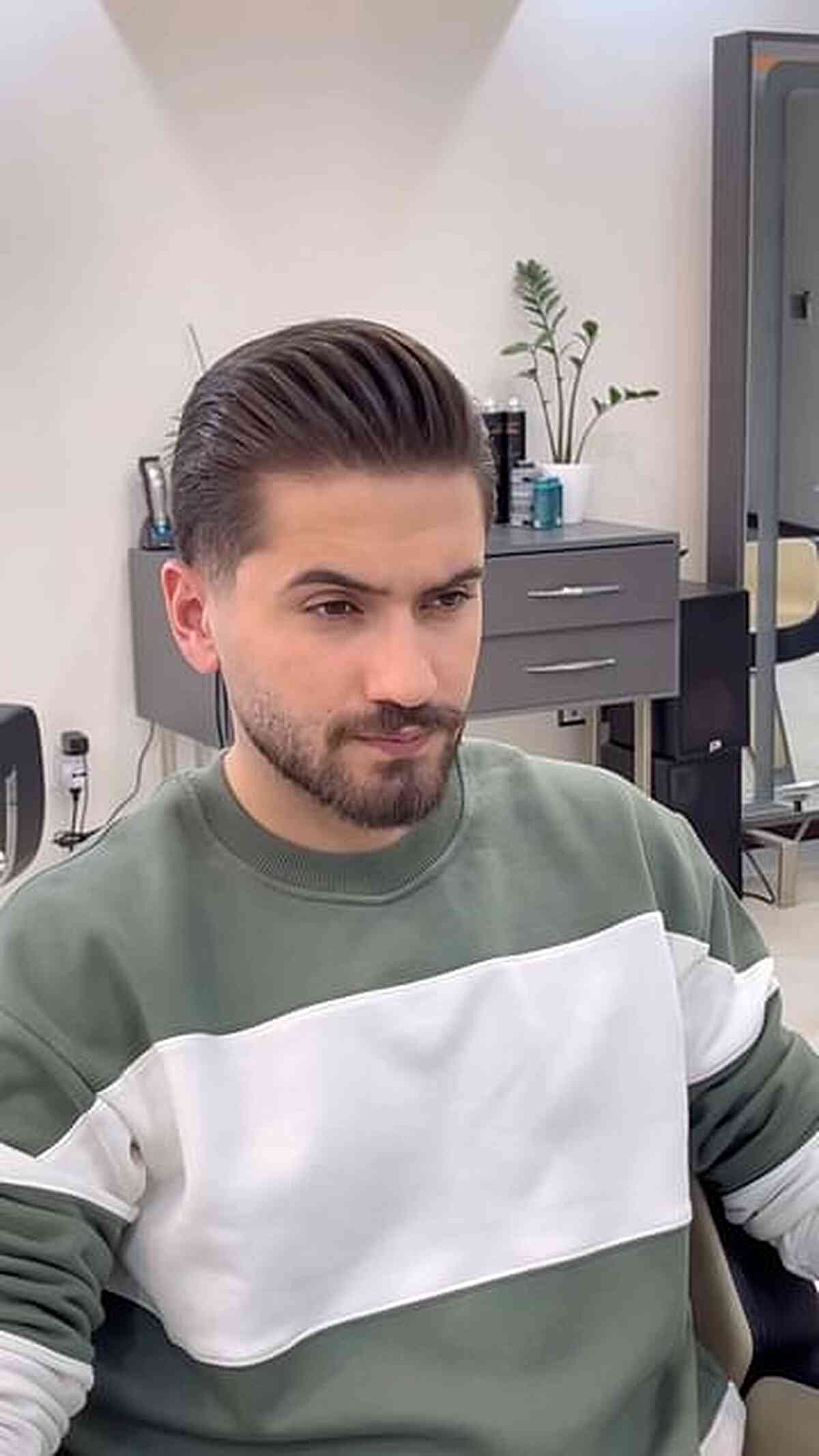 Hairstyle for men with longer hair on top and brushed back sides on Craiyon