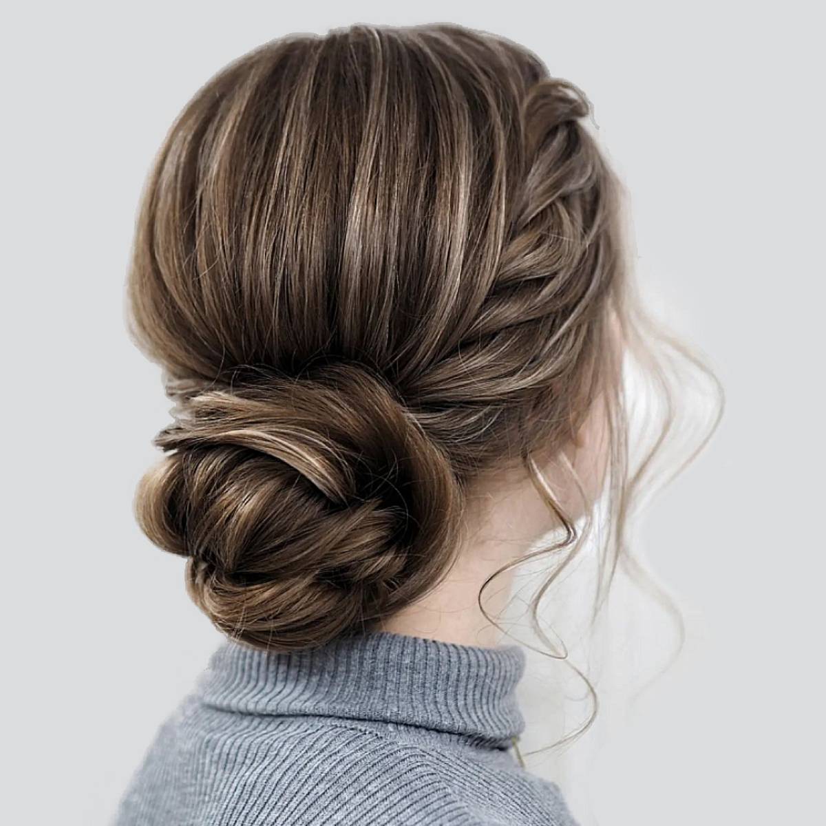 A messy bun with 10 inches of hair pieces and an ultra long, high bun with  extended wavy hair wrapped in ponytails, wigs, and ribbons. A girl with  curly hair - Cool