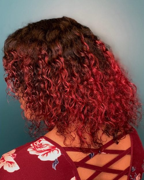 Curly hair with burgundy ombre