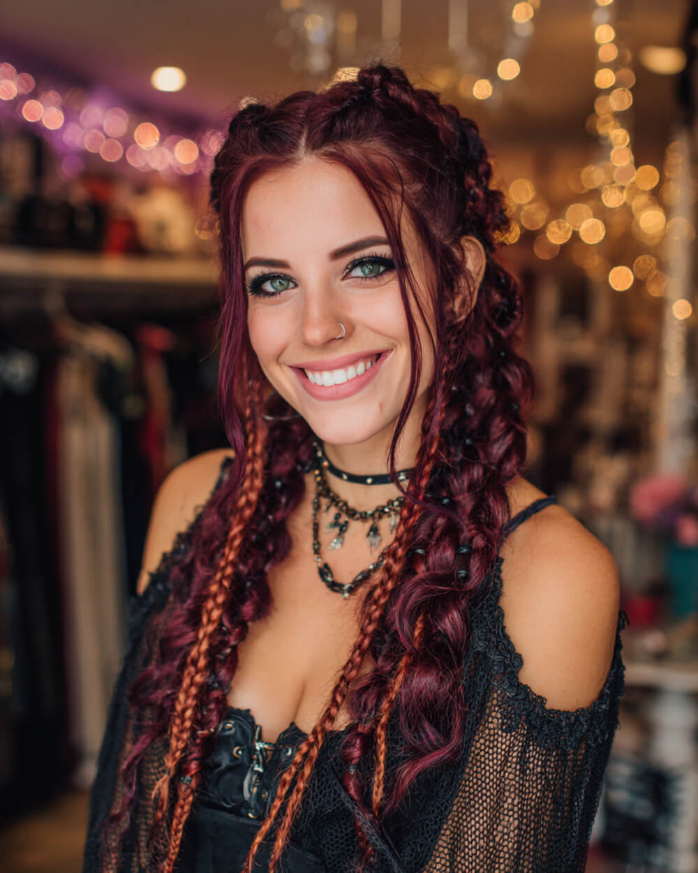 Long burgundy Viking braids with beads, fierce Halloween hairstyle