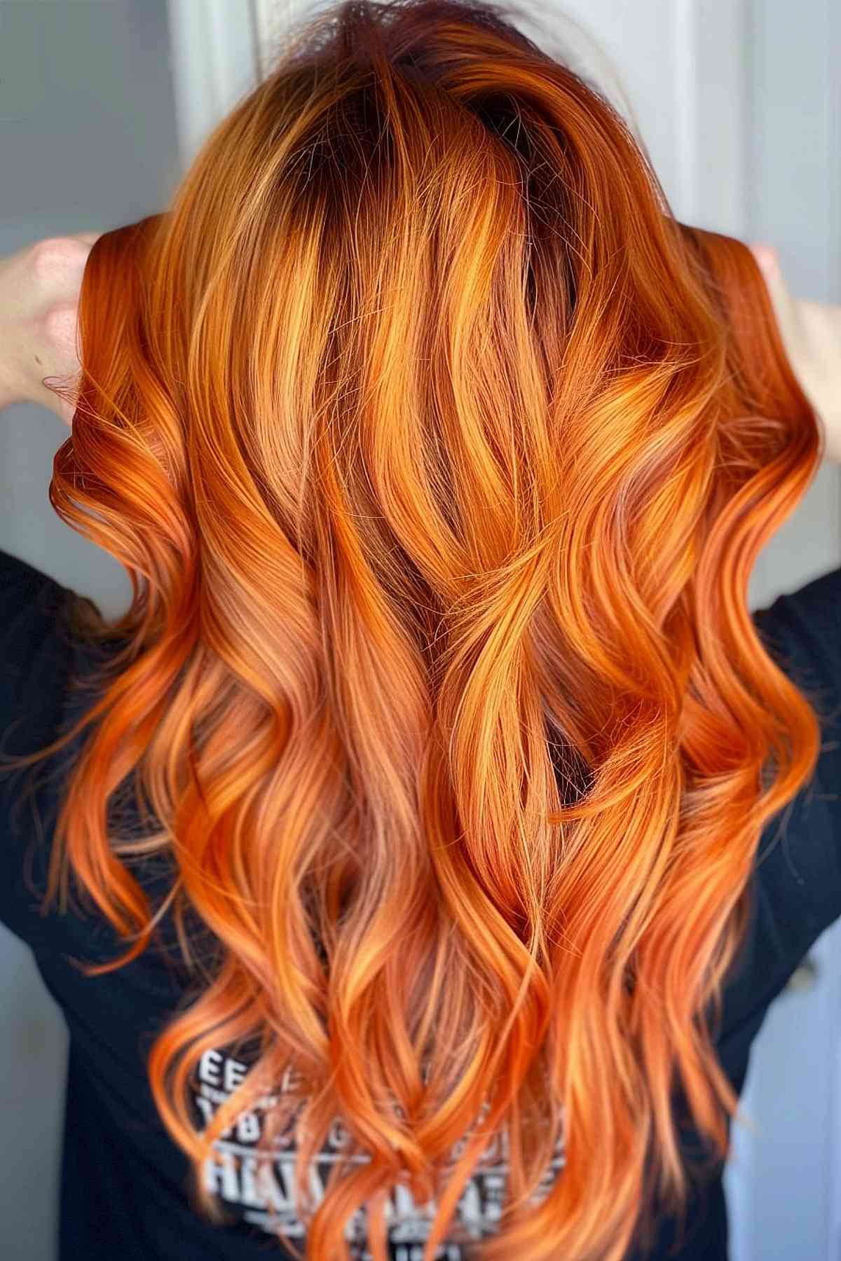 Burnt orange ginger copper hair in soft waves