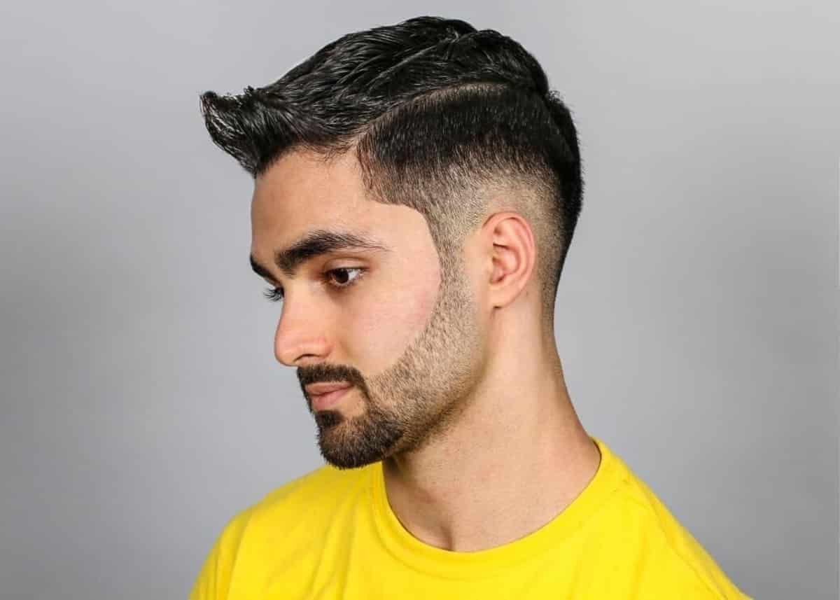 Clean Cut Burst fade and deep side part
