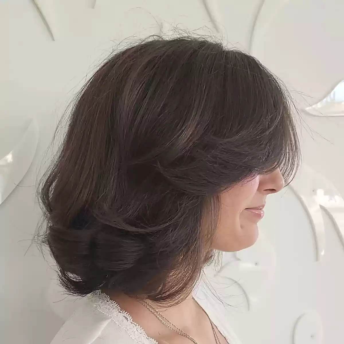 Shoulder-Length Butterfly Bob with Blowout Style for Thick Hair