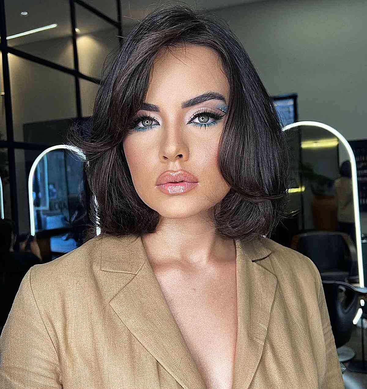 Neck-Length Butterfly Bob with Heavy Layers and Side Part