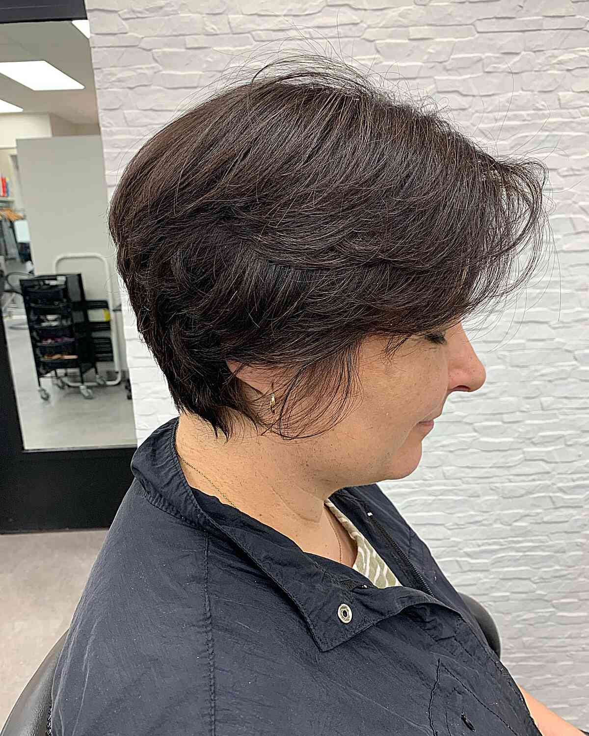 Graduated Butterfly Pixie Bob with Shorter Layers on Brunette Hair