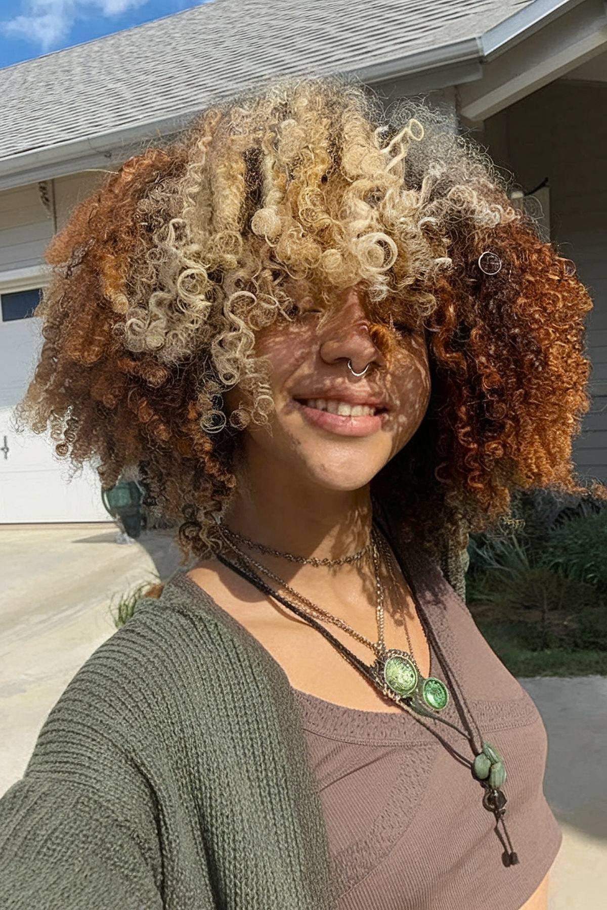 Calico afro hair with blonde and caramel tones