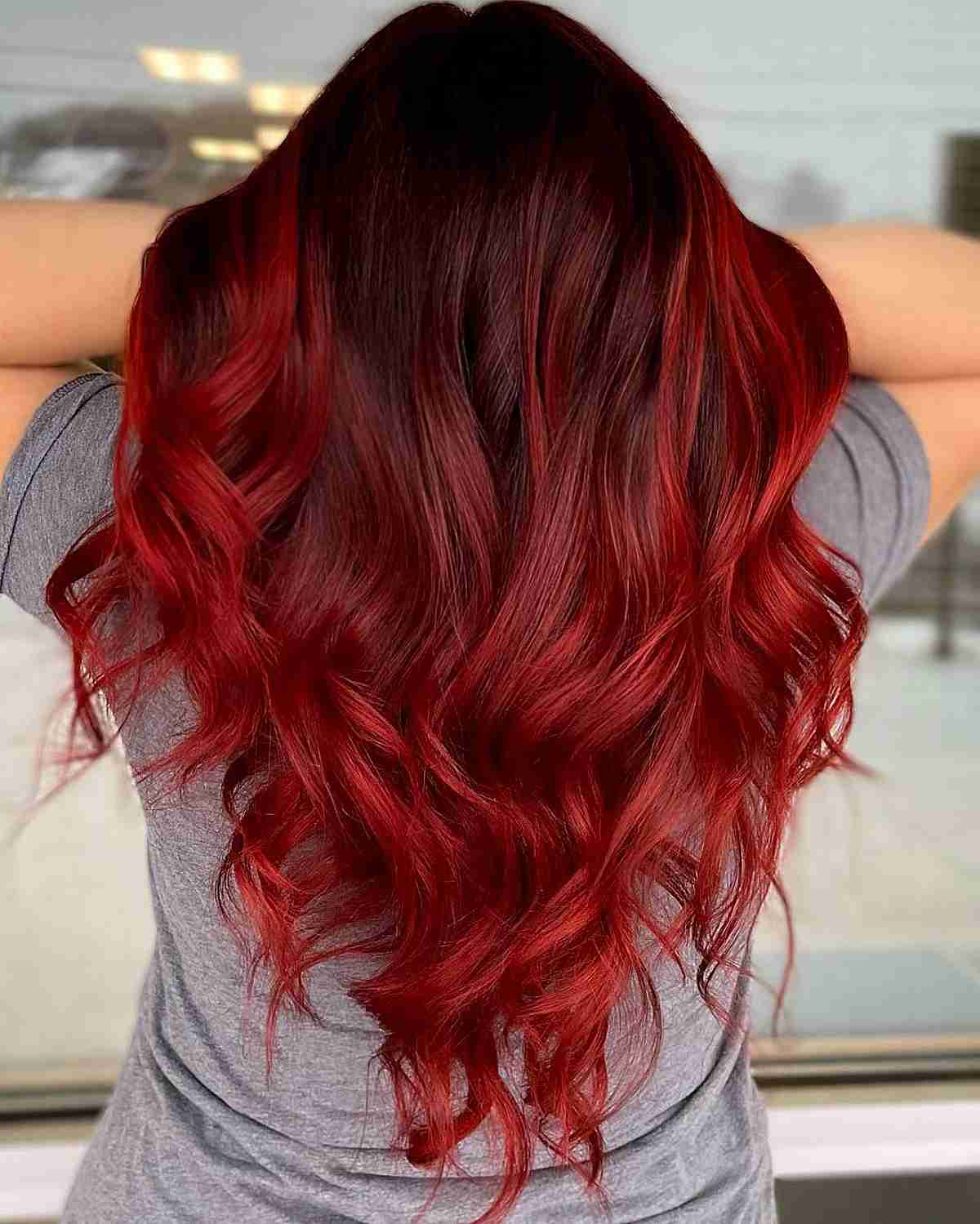 Rooted Candy Apple Red Balayage on long hair