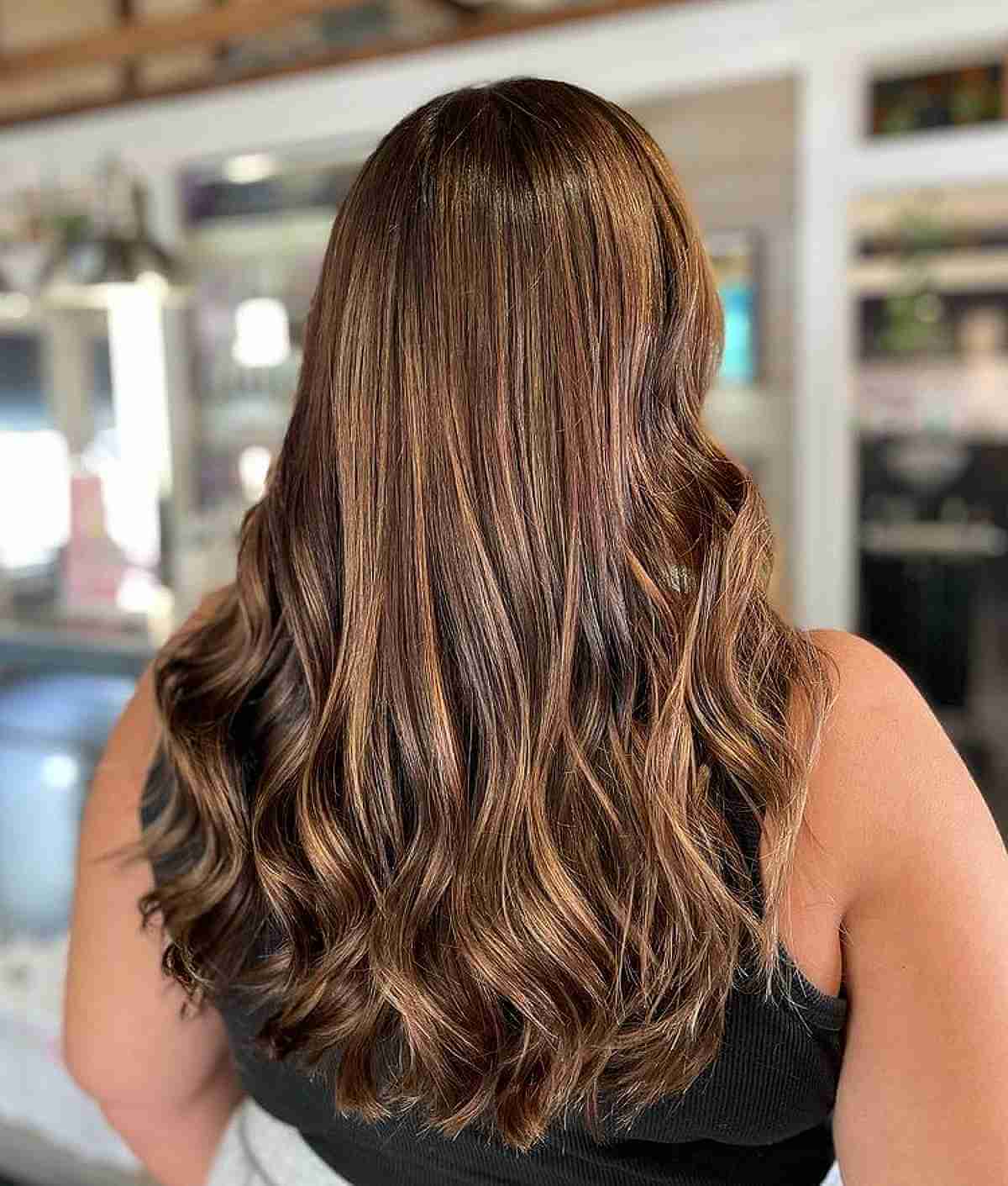 Caramel Balayage on Brown Hair with Curled Ends