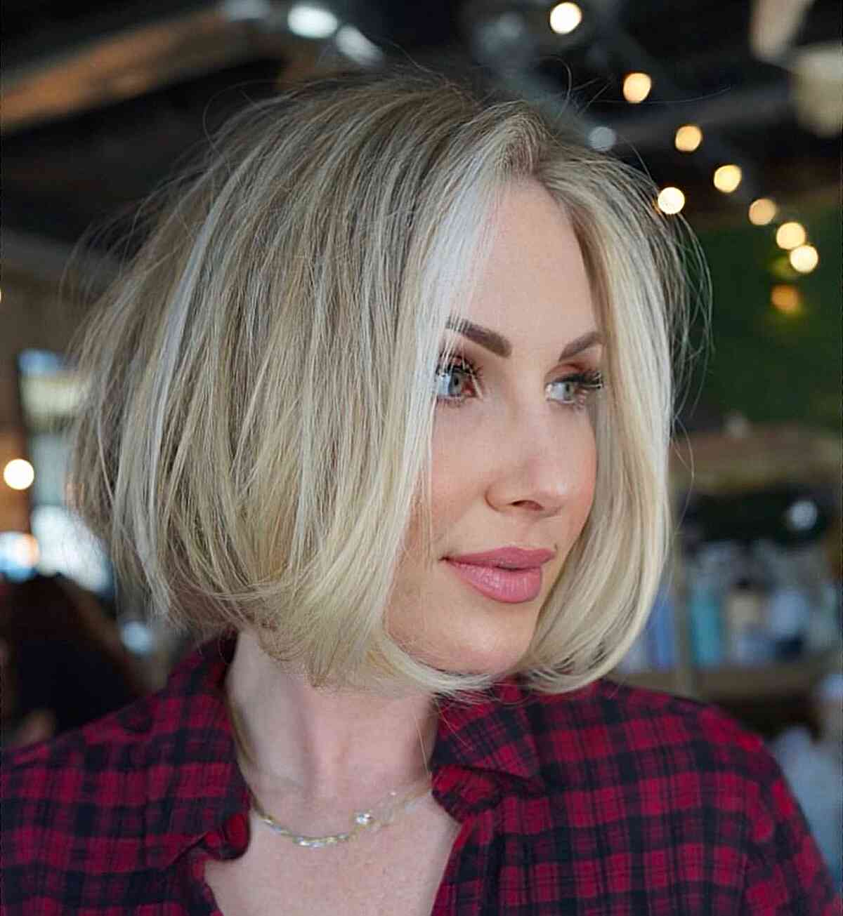 Center-Parted Soft Blonde One-Length Bob for women in their 30s