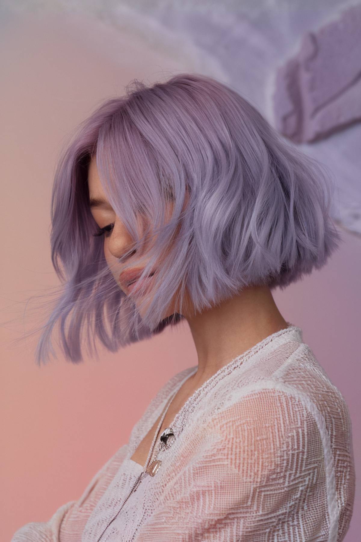 Chalcedony chic bob with a soft lilac and peach pastel gradient, inspired by the chalcedony crystal