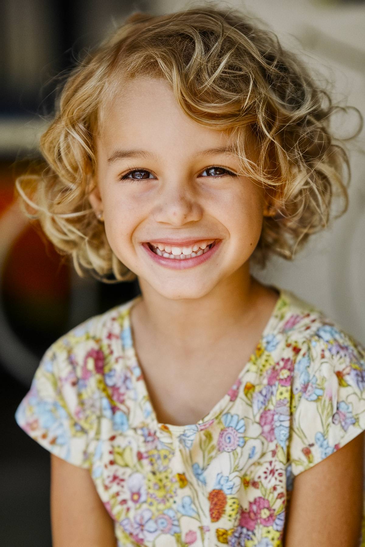 Curly chin-length bob haircut for little girls