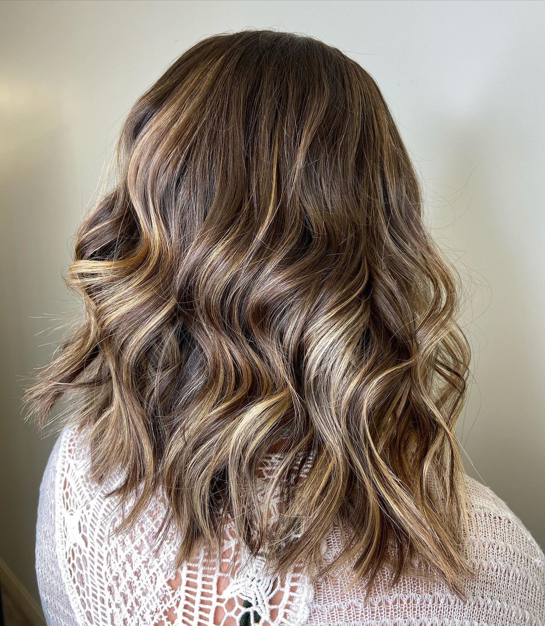 chestnut brown hair with soft blonde highlights