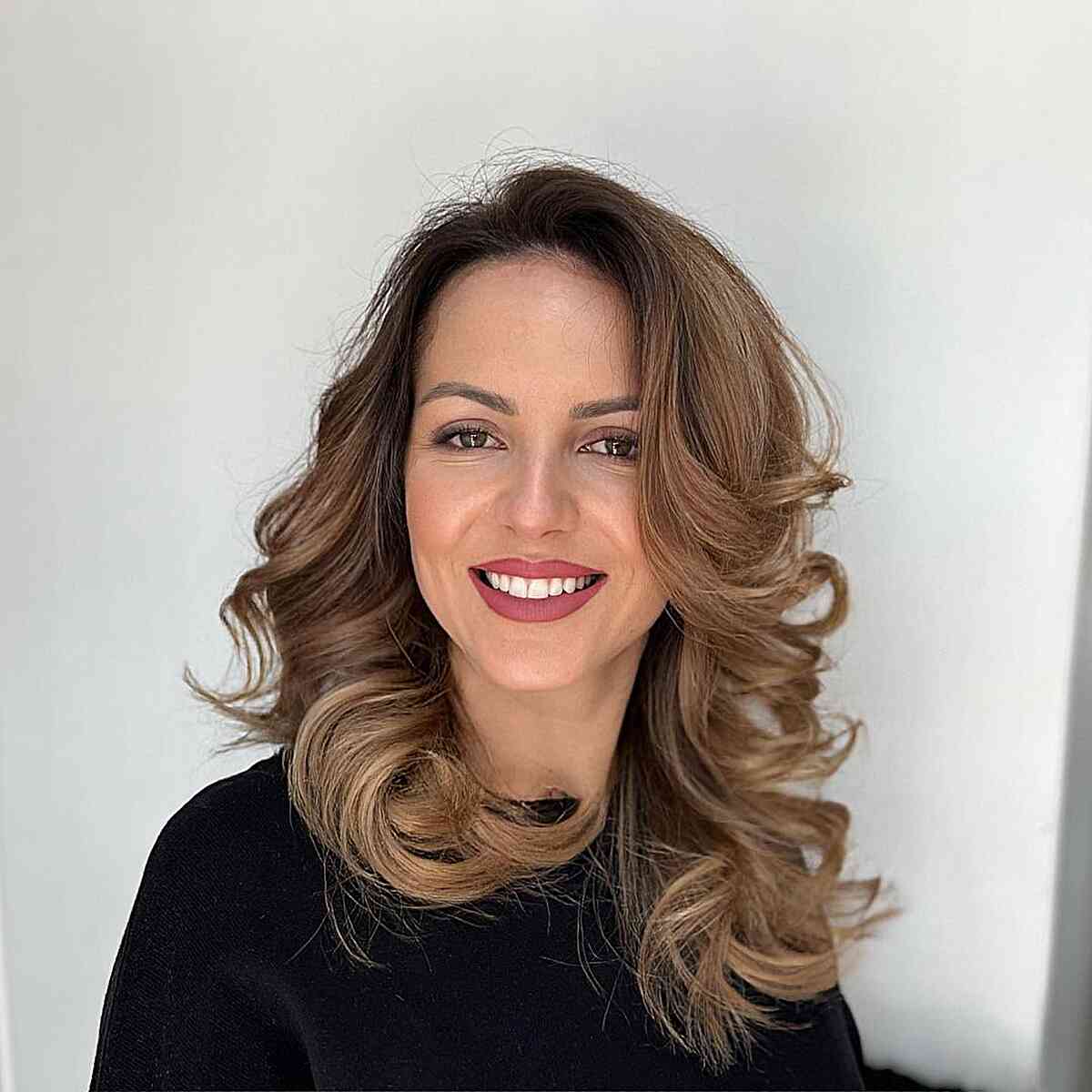 Chestnut Brown Wavy Layers for women with mid-length hair and a side part
