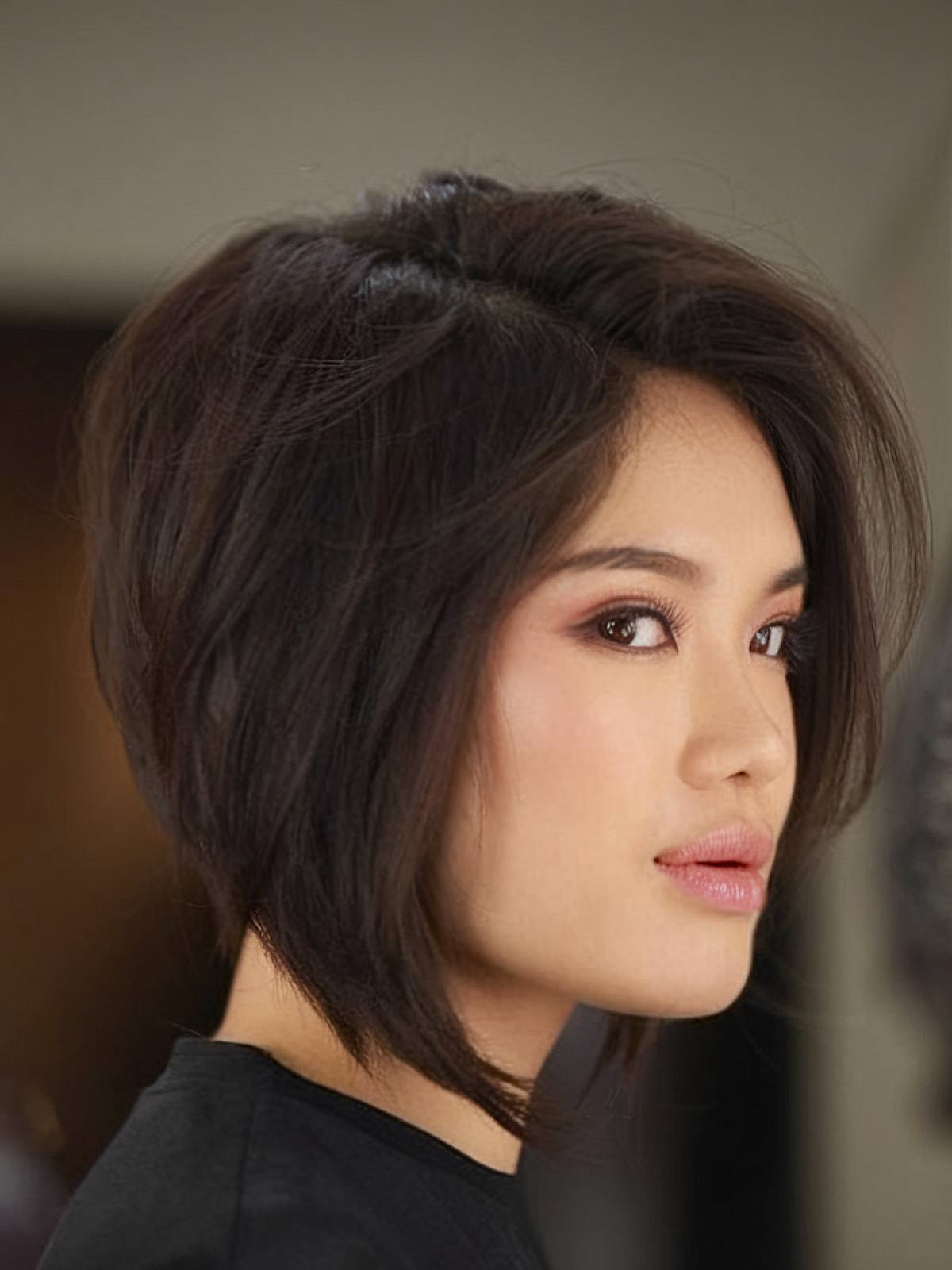 Angled bob haircut for Asian women with layered sides