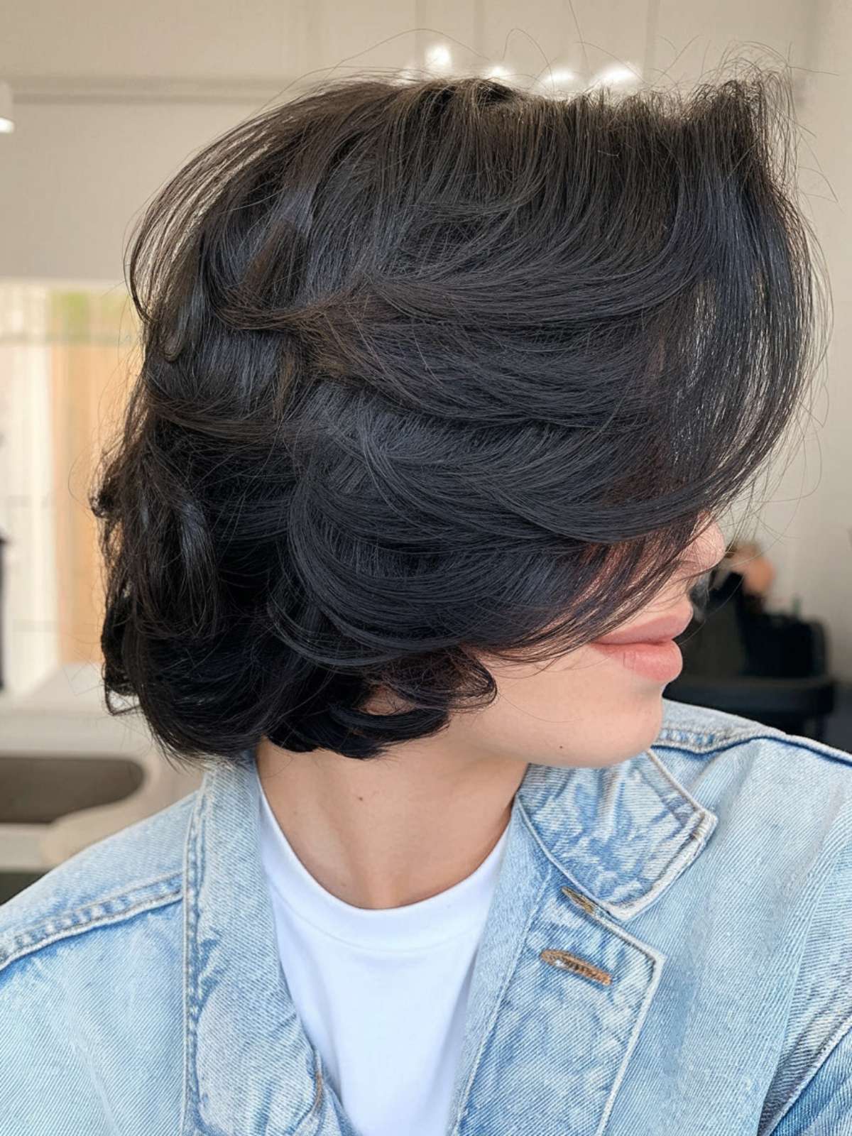 Short butterfly haircut with textured layers for fine hair