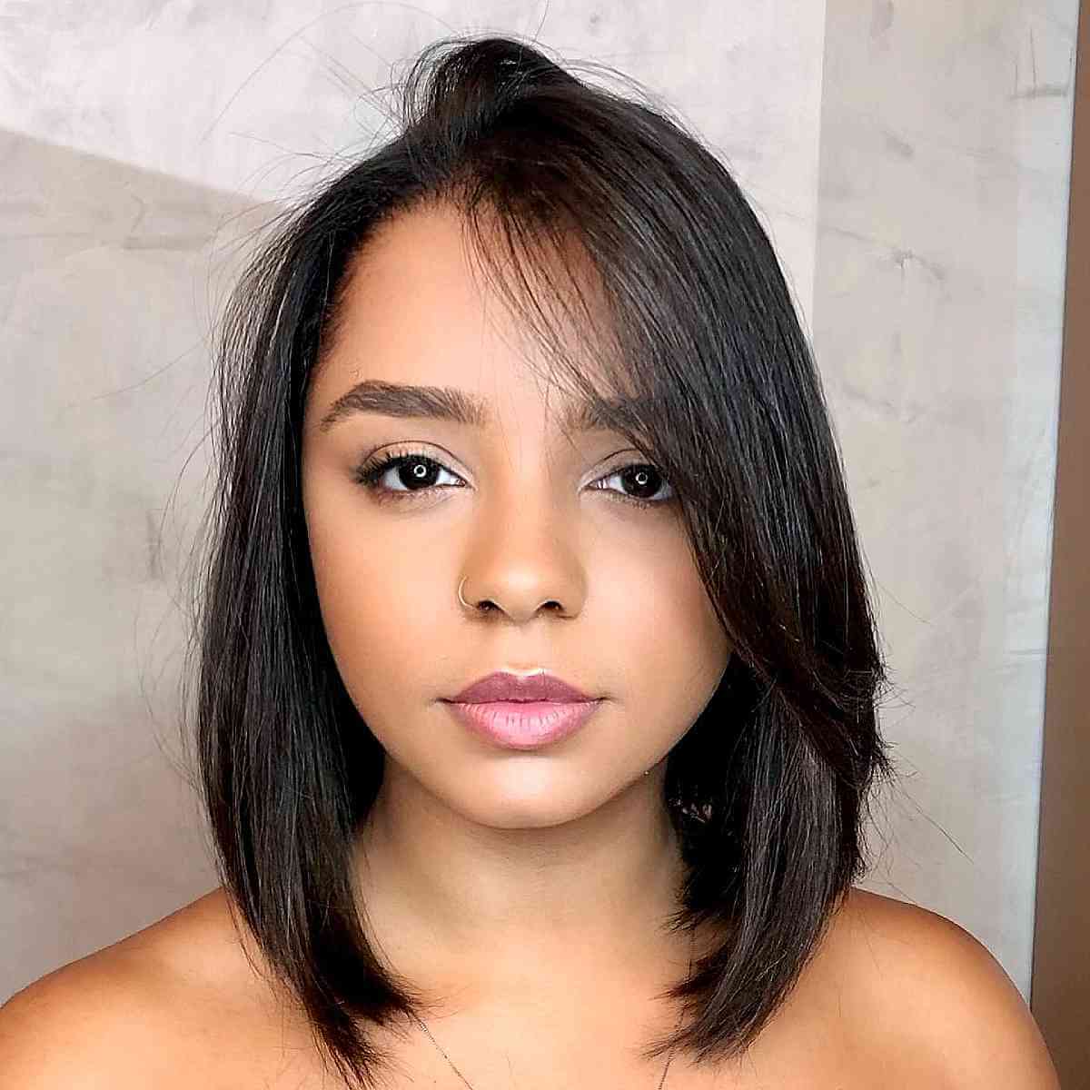 Chic Layered Bob with a Deep Side Part for Fine Hair