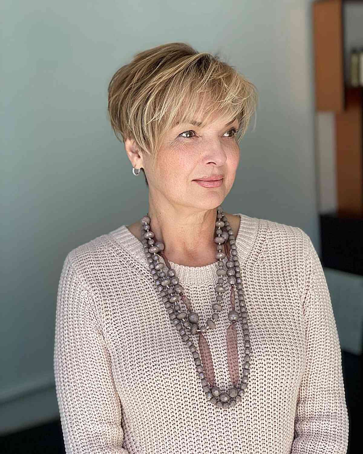 Chic Pixie Cut with Partial Highlights for older women with short hair
