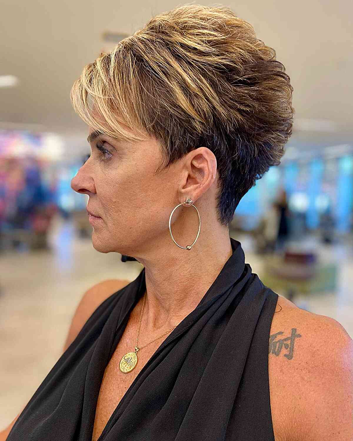 Chic Pixie with Highlights for Older Women with a sexy style and side bangs