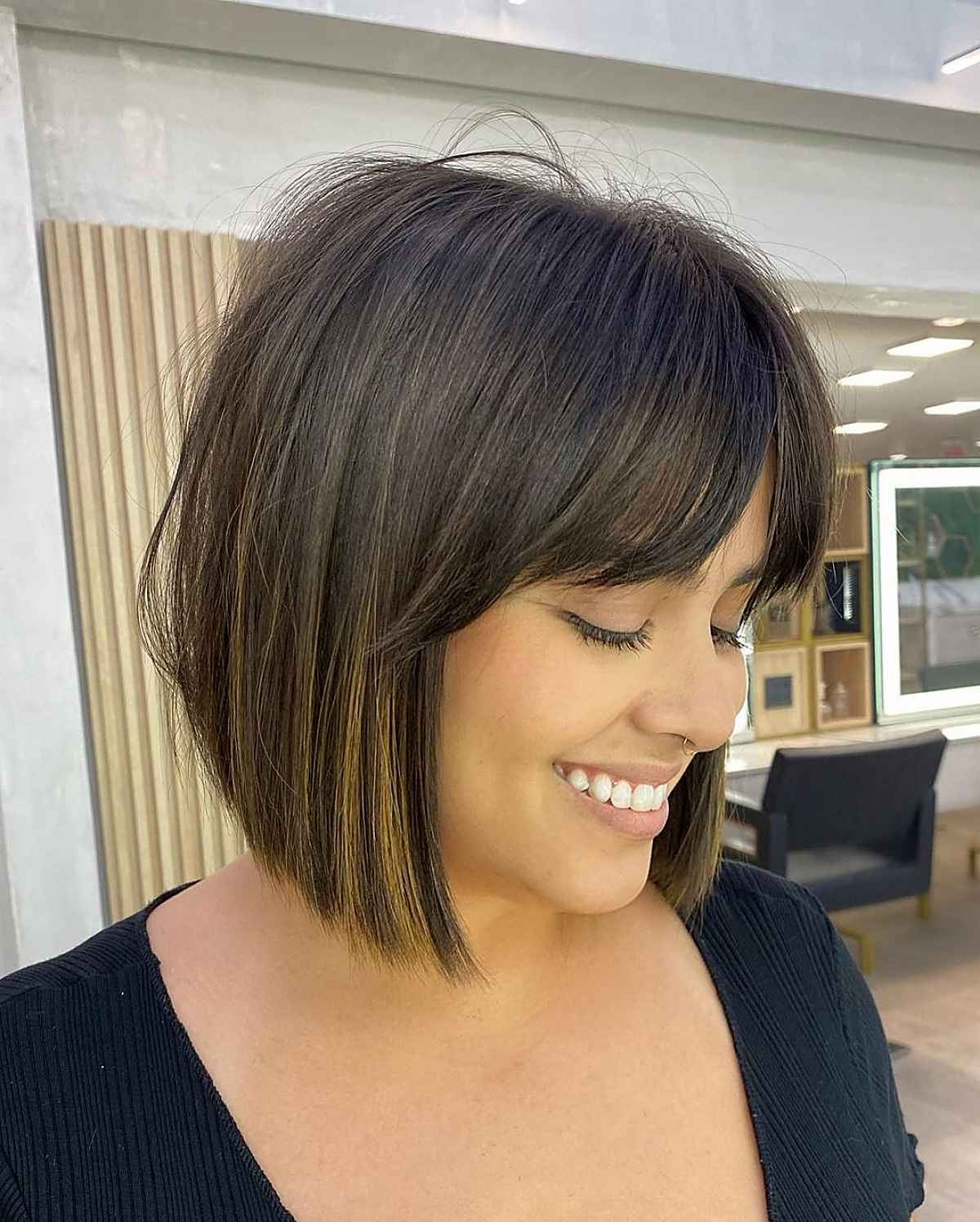 Chin-Length Angled Cut with Curtain Bangs