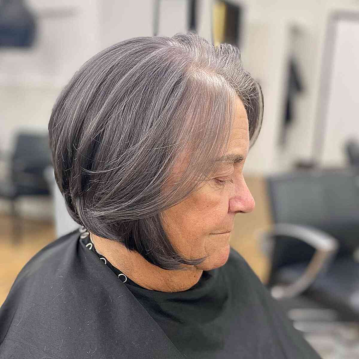 Chin-Length Angled Medium Bob with Soft Layers for Women Aged 60