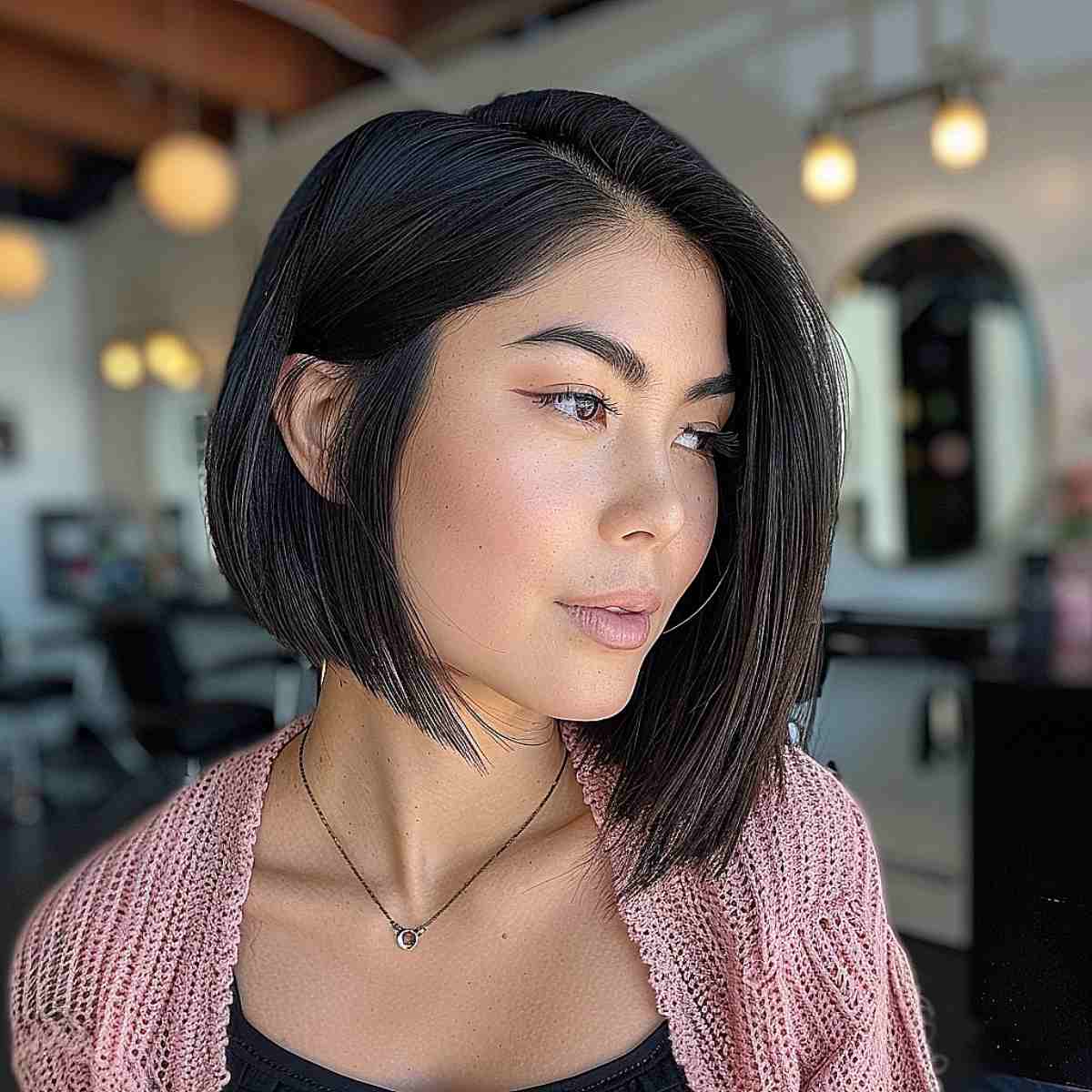 Chin-Length Asymmetrical Cut for Ladies