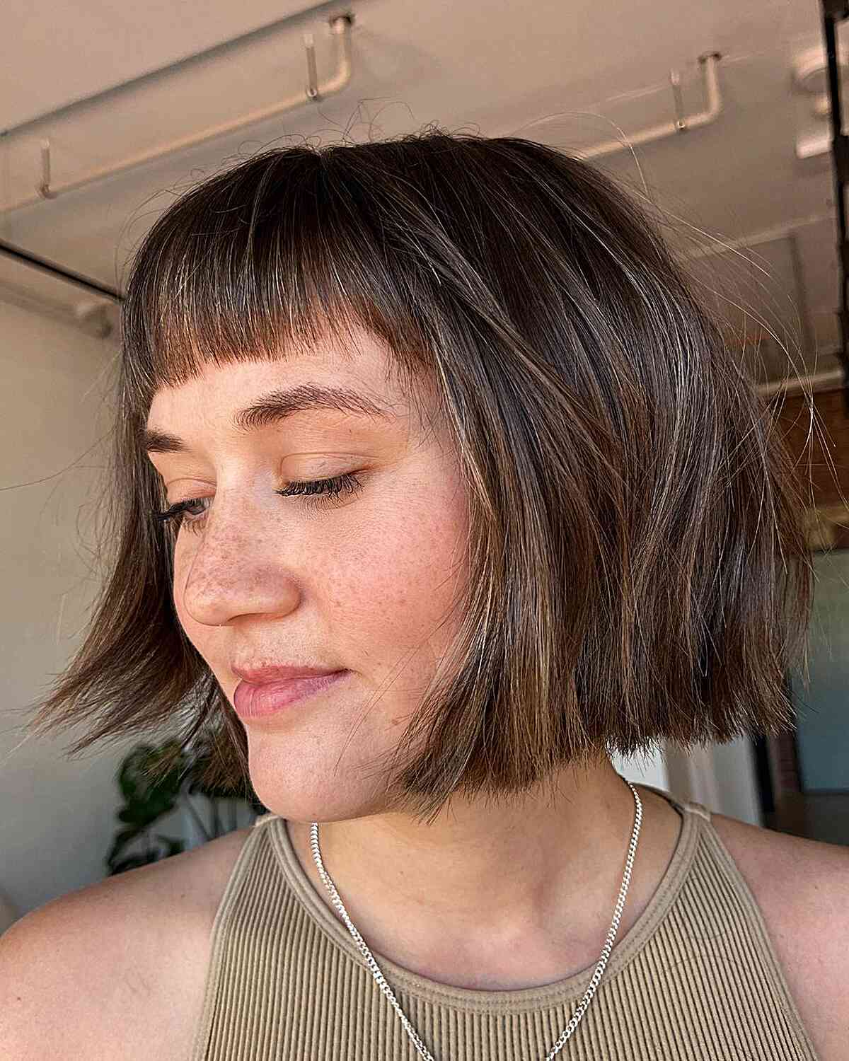 Chin-Length Blunt Bob with Semi-Short Bangs on thick hair