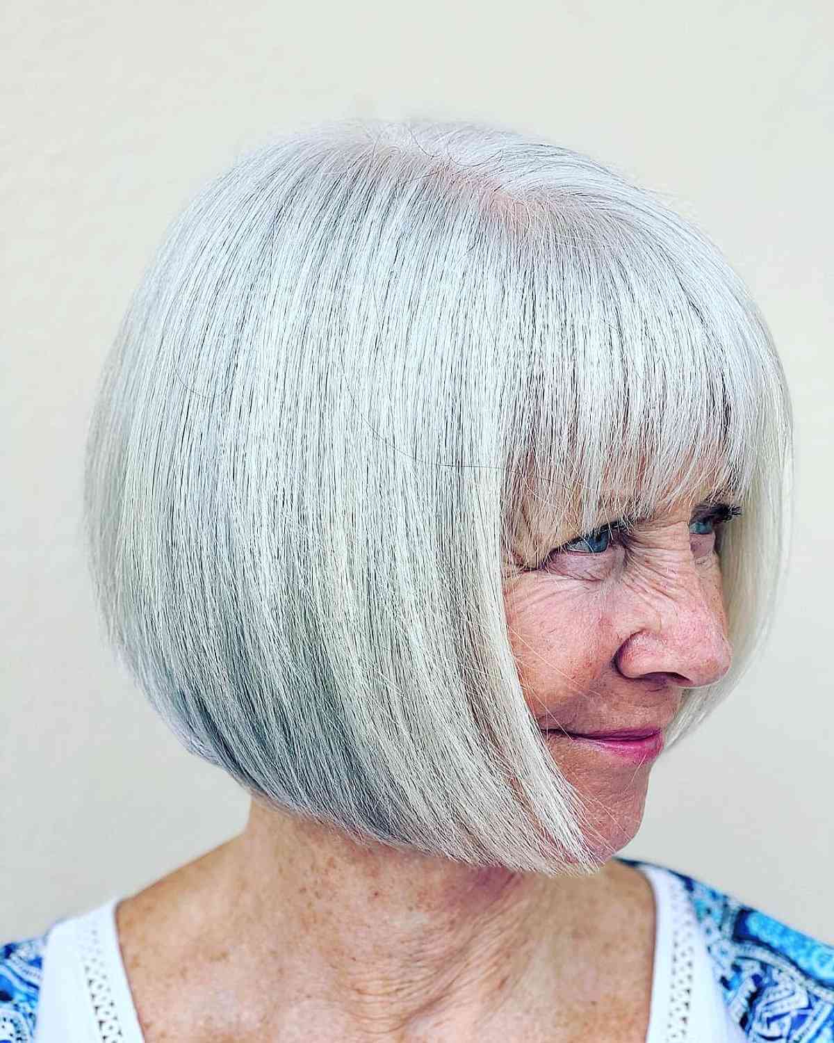 Chin-Length Bob Haircut with Full Bangs for Women Seventy and Over