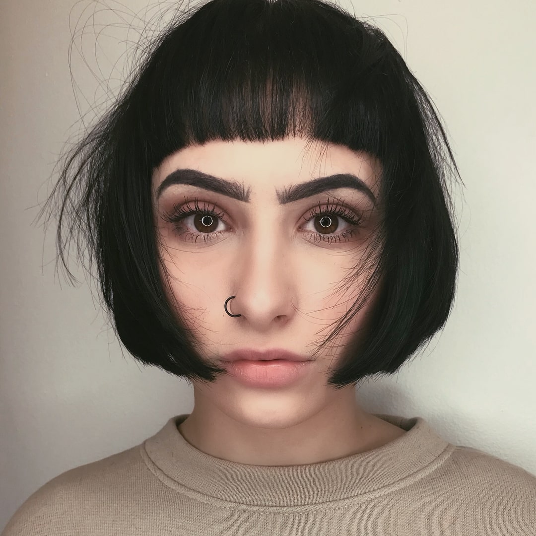 Chin-Length Bob with Blunt Bangs for Long Face Shapes