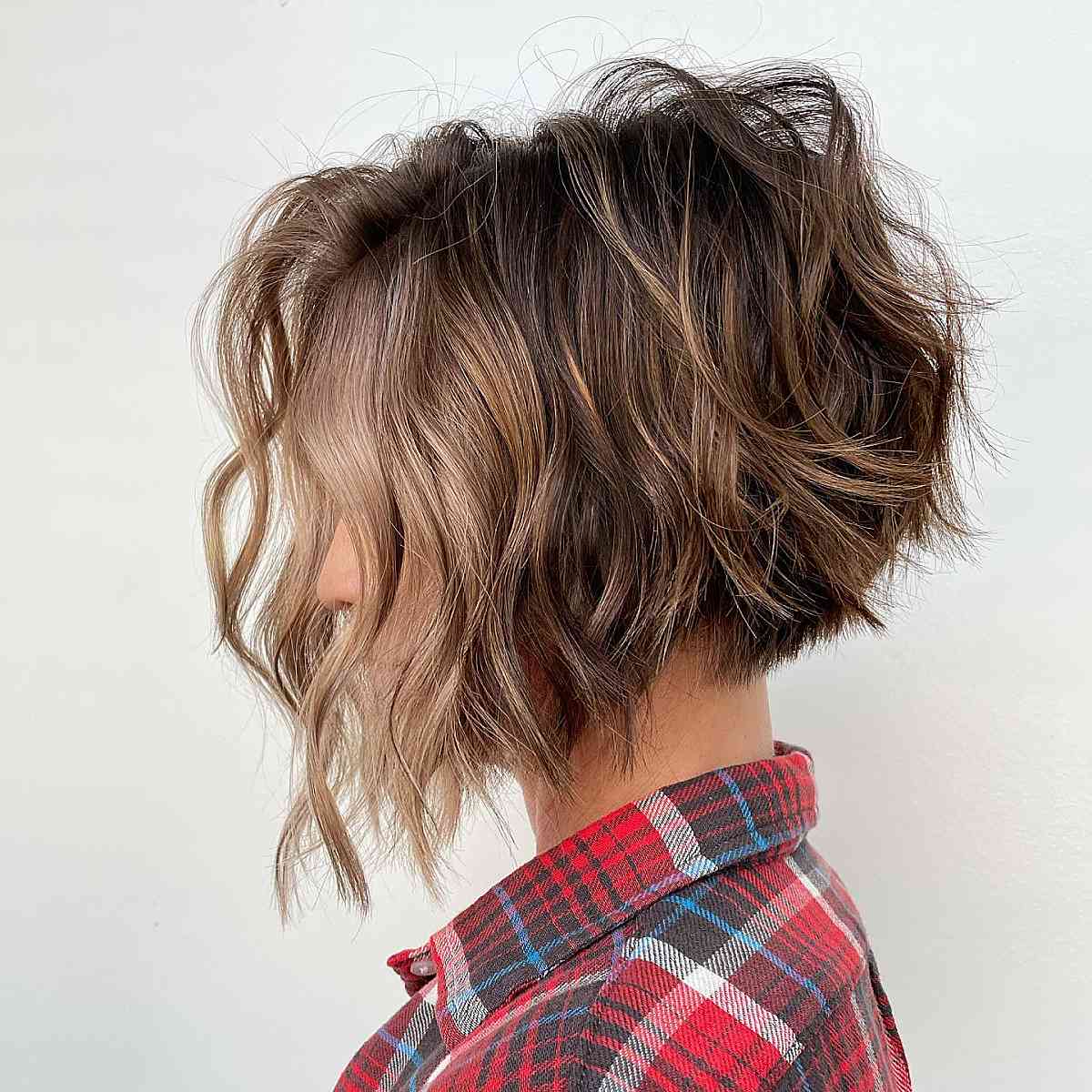 Modern chin-length bob with waves for short thick hair