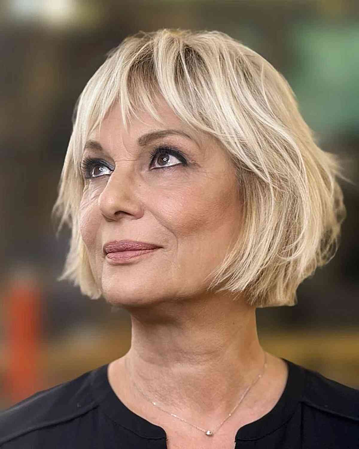 Chin-Length Choppy Crop with Bangs for Ladies in their 60s