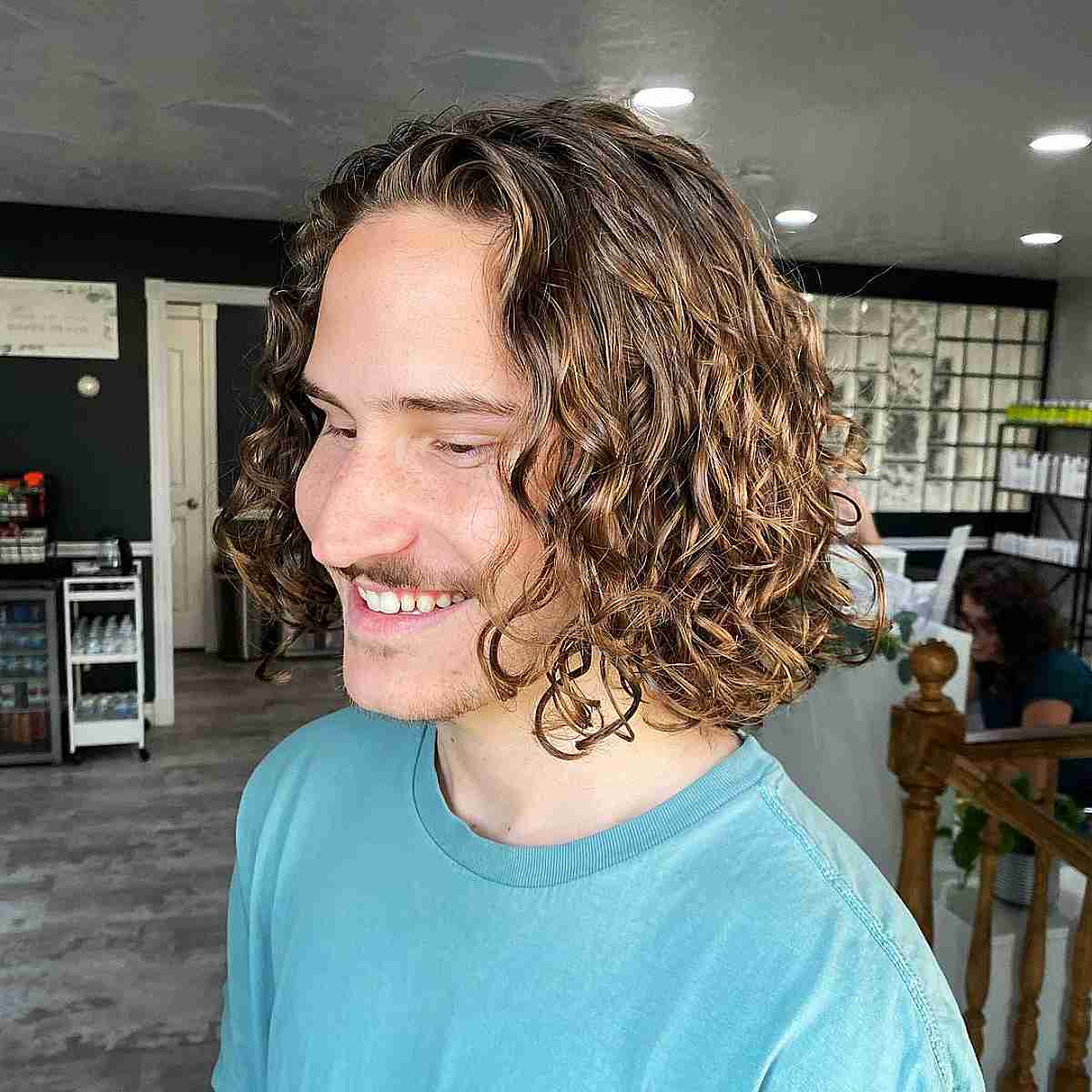 Chin-Length Curly Cut with Layers for Men