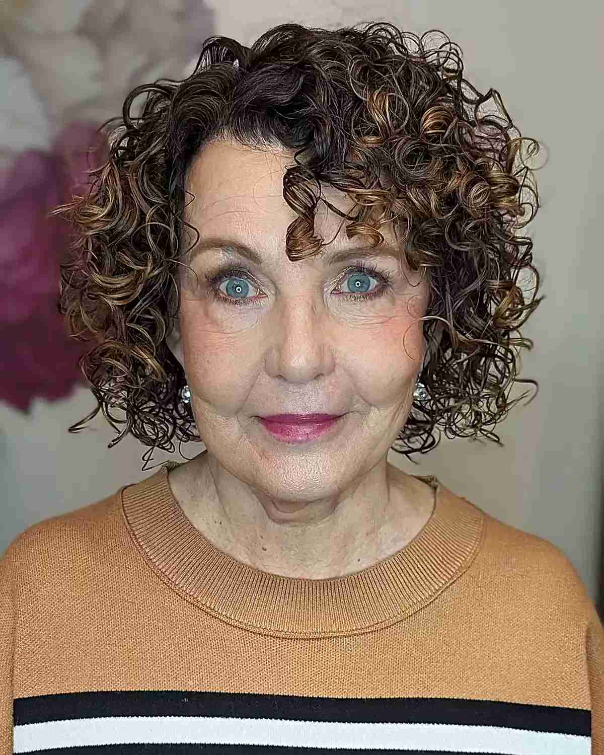 Chin-Length Curly Cut with Side Bangs on 60-year-old Ladies