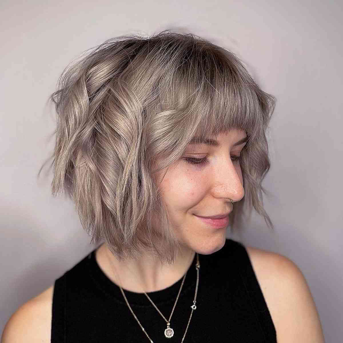 Chin-Length Layered Haircut with a Fringe