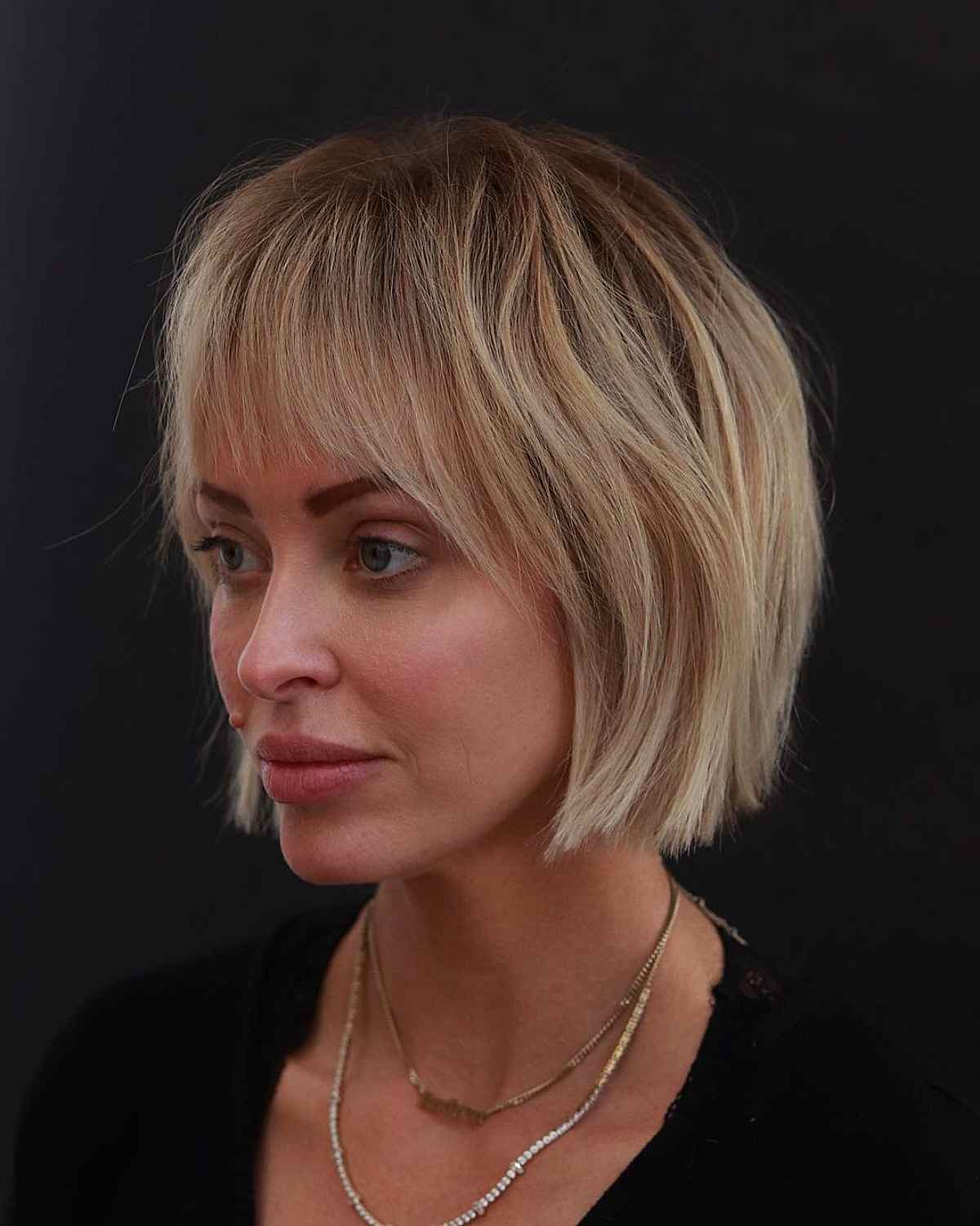 Chin-Length Lived-In Blonde Bob with Wispy Bangs