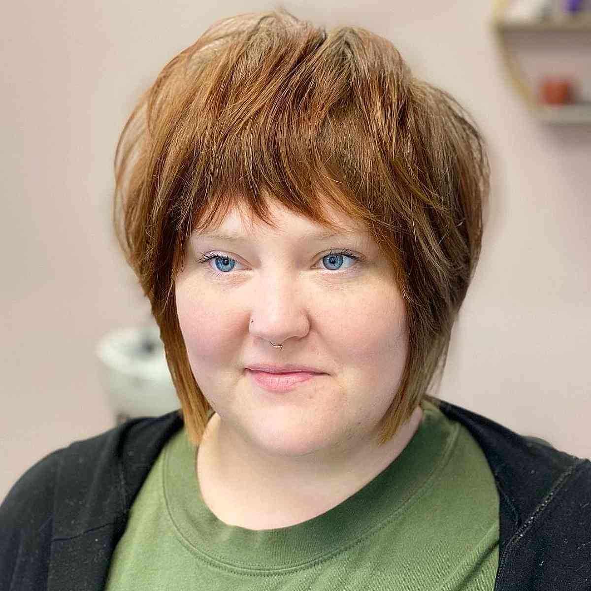 Chin length shaggy bob with layers for round faces